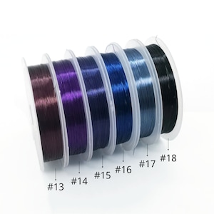 May include: Spools of colorful wire in shades of purple, blue, and black. The spools are labeled with numbers 13 through 18.