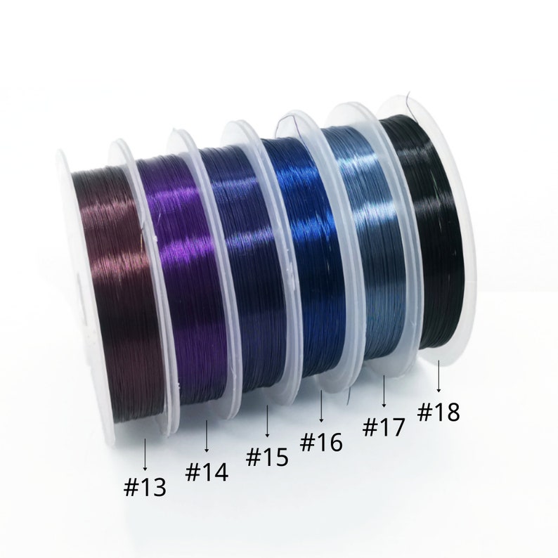 May include: Spools of colorful wire in shades of purple, blue, and black. The spools are labeled with numbers 13 through 18.