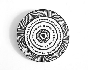 Plaster disc wall decoration