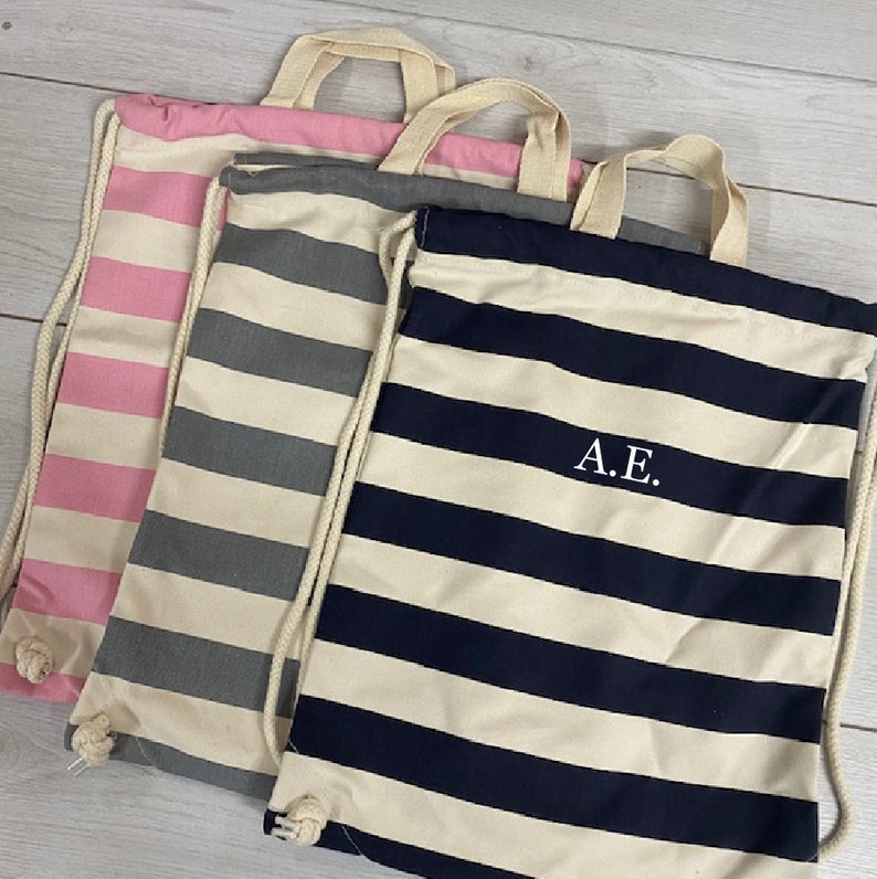 Personalised cotton drawstring bag, pink, grey, navy.