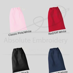 A selection of four drawstring bags describing the item colour.  These are Classic Pink/White, Red/ Off white, Black/Black and Navy/Off white.