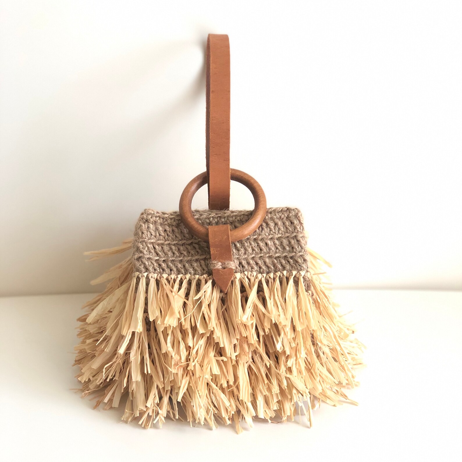 CROCHETED MINI FLOWER FRINGE KNOT WRISTLET • red