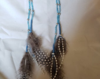 self collected handmade feather earrings flamingo