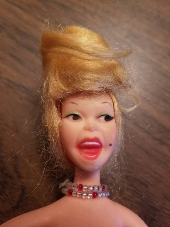doll with messy hair