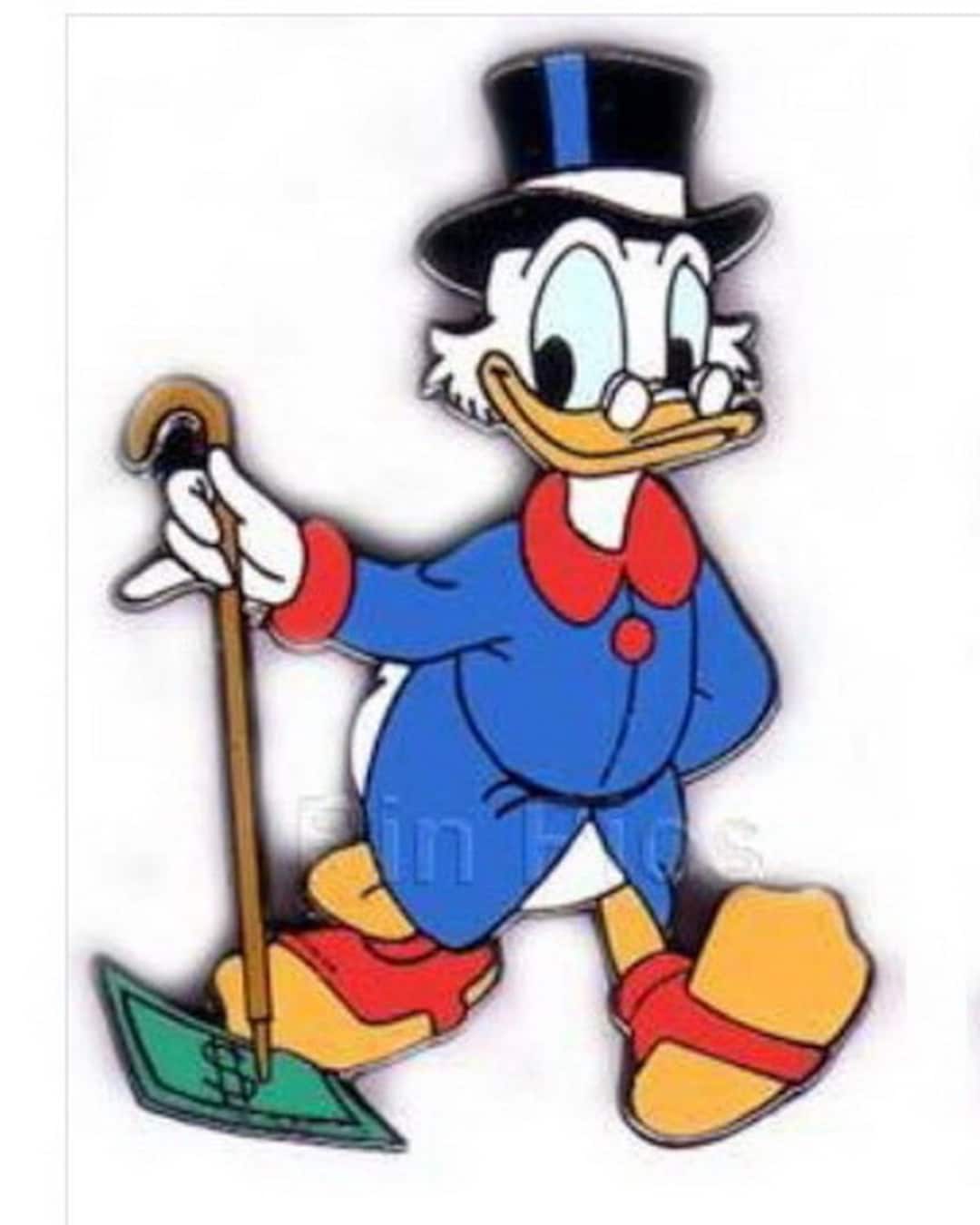 杖を持ったスクルージ・マクダックが紙幣を拾うヴィンテージピン