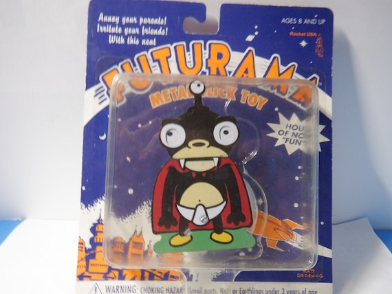 2001 Futurama Nibbler Metal Click Toy on Card - Etsy