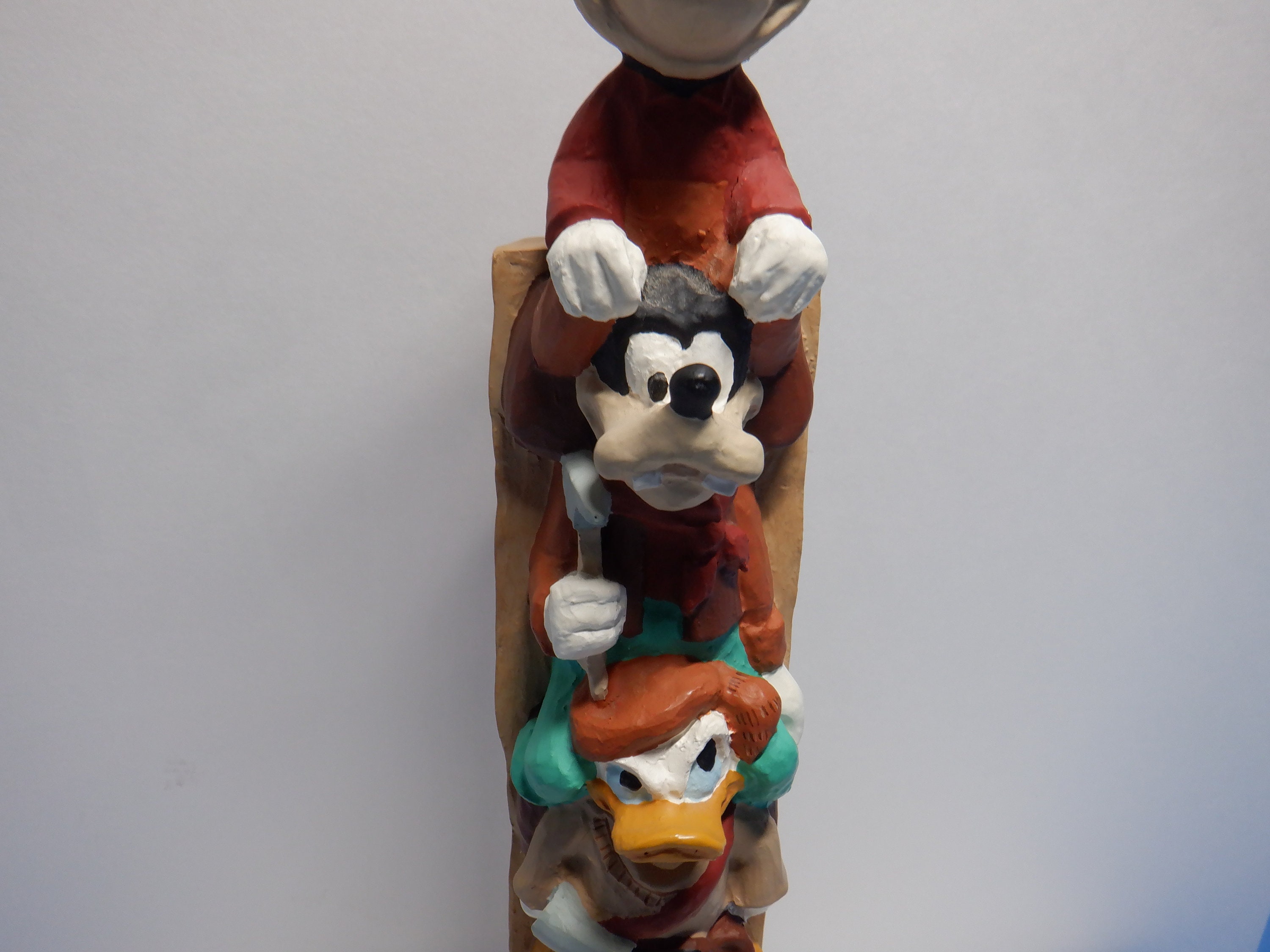 Vintage Disney Totem Pole Mickey Goofy Donald and a Bear figurine