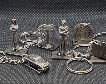 Escena reciclada It 007 Bond Edition Llaveros de fichas de metal