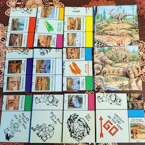 Upcycled Monopoly Junior Dino Dig Edition Spielbrett Untersetzer Set mit 12 Stück