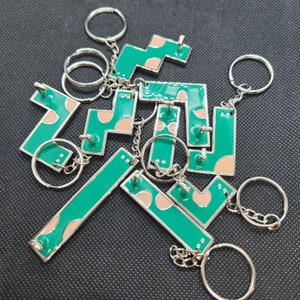 Upcycled Putt Putt Mini Golf Puzzle Game Metal Token Keychains