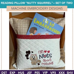 May include: A white reading pillow with a red pocket and a quilted design. The pillow has an embroidered squirrel with the text "I'm Nuts about reading".