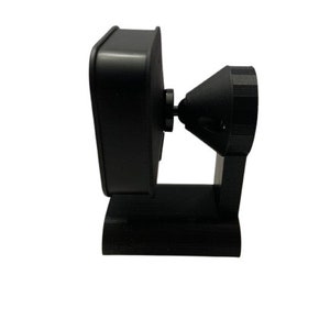 May include: A black security camera mounted on a black stand. The camera has a wide-angle lens and a rectangular shape.