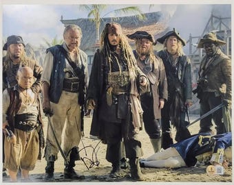 キーラ・ナイトレイの直筆サイン入り11x14パイレーツオブカリビアン