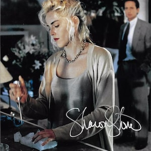 Sharon Stone Autographed Signed 11x14 Basic Instinct Photo BECKETT