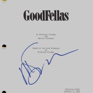 May include: A gray shooting draft of the film "GoodFellas" with the title in bold black font. The script is signed in blue ink. The text includes the names of Nicholas Pileggi and Martin Scorsese.