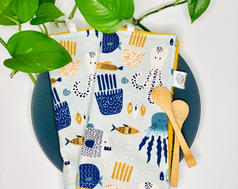 Table napkins in absorbent fabric for children sold in batches of 2 or 4 large table squares
