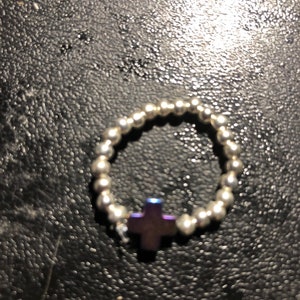 Silver beaded purple cross stretch ring