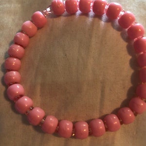 Handmade pink beaded bracelet