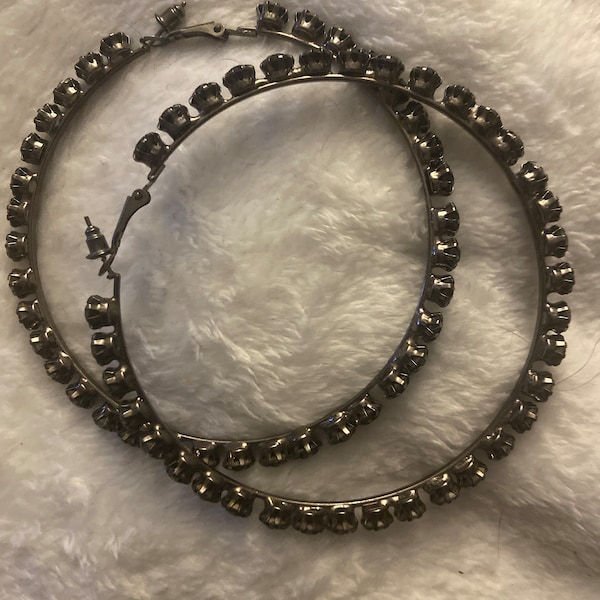 Large silver hoops with black bling stones