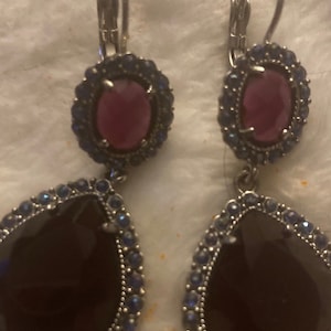 Silver dangle with red gemstones and hemitite rhinestones