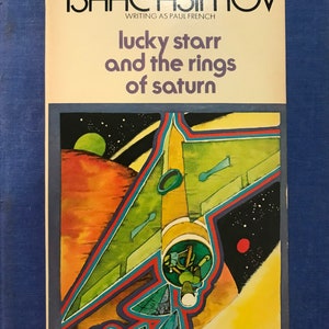 Lucky Starr and the rings of Saturn by: Issac Asimov writing as Paul French. Paperback.