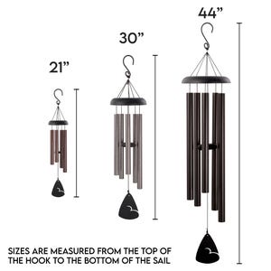Three wind chimes in different sizes, 21 inches, 30 inches, and 44 inches. The chimes are made of metal and have a bronze, silver, or black finish. Each chime has a teardrop-shaped sail at the bottom.