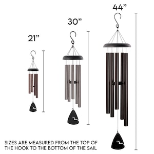 Three wind chimes in different sizes, 21 inches, 30 inches, and 44 inches. The chimes are made of metal and have a bronze, silver, or black finish. Each chime has a teardrop-shaped sail at the bottom.