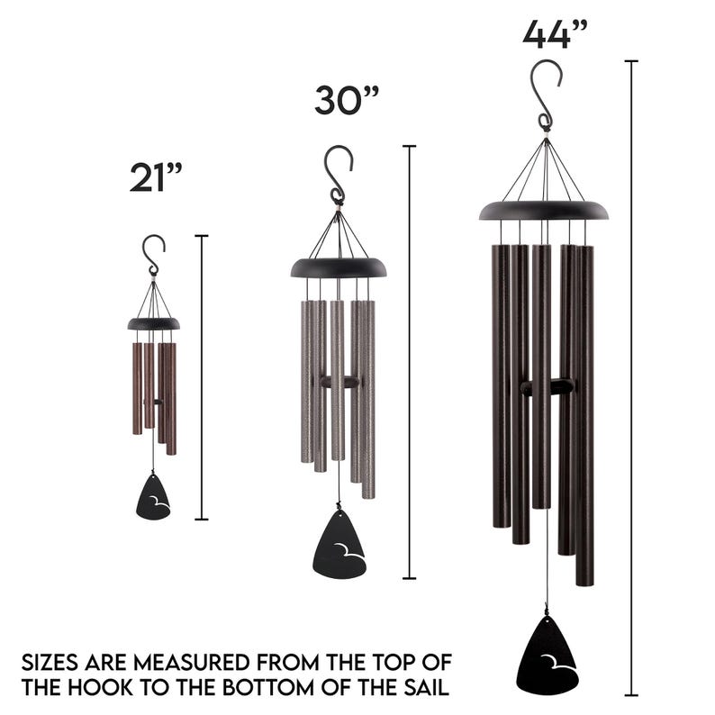 Three wind chimes in different sizes, 21 inches, 30 inches, and 44 inches. The chimes are made of metal and have a bronze, silver, or black finish. Each chime has a teardrop-shaped sail at the bottom.