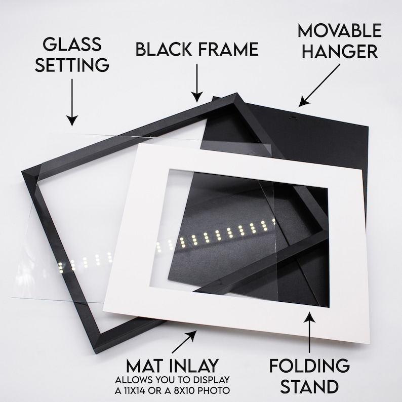 May include: A black picture frame with a white mat inlay, glass setting, and a movable hanger. The mat inlay allows you to display a 11x14 or 8x10 photo. The frame also includes a folding stand.
