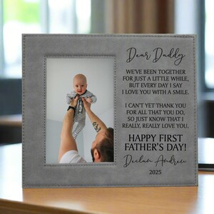 Personalized First Father's Day Picture Frame engraved with "Dear Daddy" Poem on a desk in an office