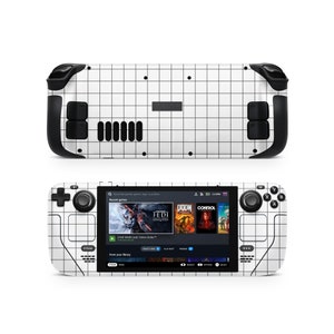 May include: A white handheld gaming device with a black grid pattern on the back and front. The device has a black screen displaying a game library with titles like "Star Wars Jedi: Fallen Order" and "DOOM".