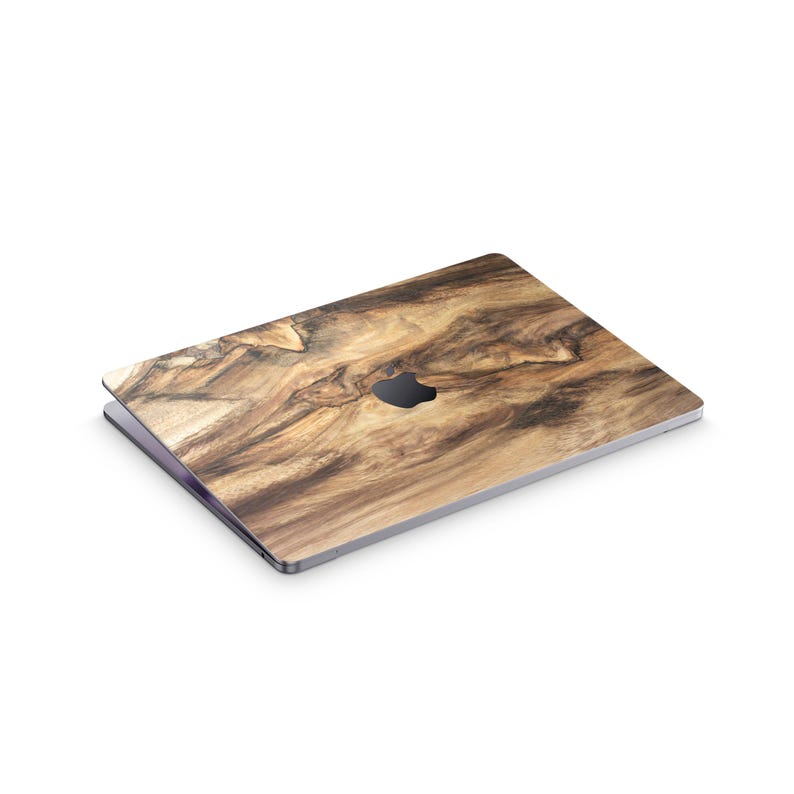 a laptop with a wooden-looking design on its surface.