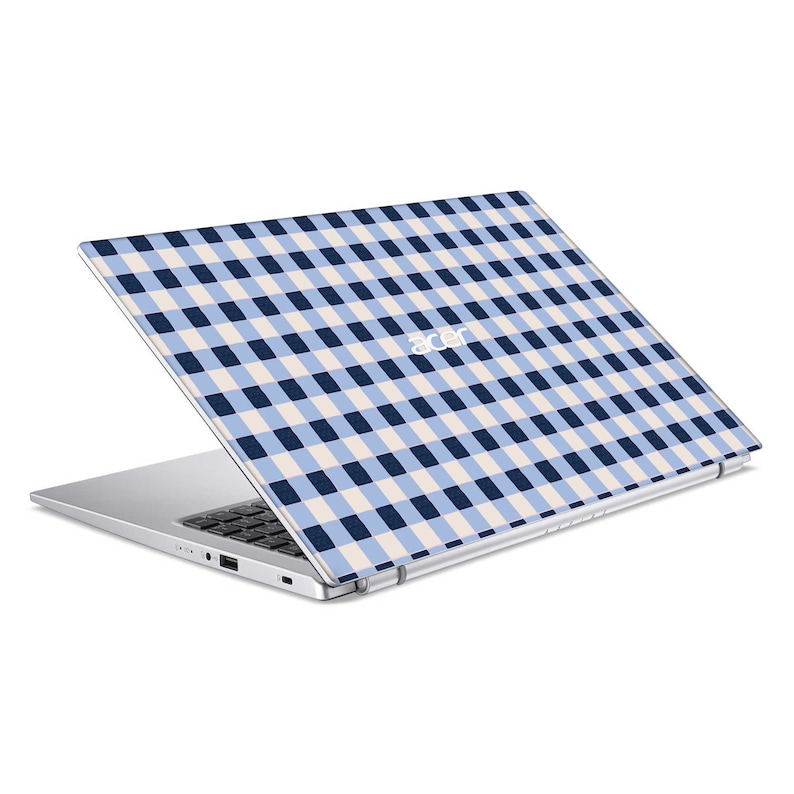 a laptop computer with a blue and white checkered pattern
