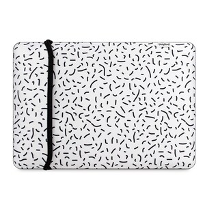 Puede incluir: Una funda para port&aacute;til blanca con un patr&oacute;n geom&eacute;trico blanco y negro. La funda tiene una correa negra y el texto "Unigfind" est&aacute; impreso en la esquina superior derecha.