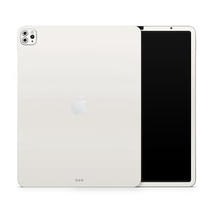 May include: A white tablet with a black screen, featuring a triple-lens camera and the Apple logo. The device is shown from the back and side, showcasing its sleek design and rounded corners.
