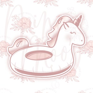 Könnte beinhalten: Ein rosa-weißer Einhorn-Schwimmring mit einem Horn und geschlossenen Augen. Der Schwimmring ist in Form eines Einhornkopfes mit einem Ring um den Hals geformt.