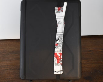 May include: Black tablet case with a Mickey Mouse print fabric pen holder and a white stylus.