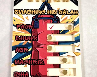 May include: A rectangular prayer tracker board featuring the name Elijah in gold letters, a red punching bag graphic, and the text Smashing His Salah. It includes five horizontal slots for Fajr, Dhuhr, Asr, Maghrib, and Isha, each with a sliding gold token.