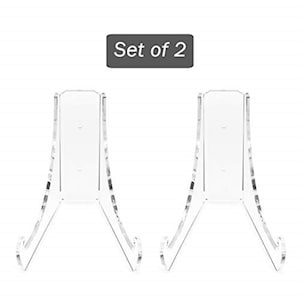 May include: Set of two clear acrylic plate stands.  The stands are shaped like a triangle with a flat top to hold a plate.