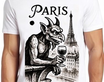 May include: White t-shirt featuring a black and white illustration of a gargoyle holding a wine glass, with the Eiffel Tower and the word "PARIS". The design is a graphic print.