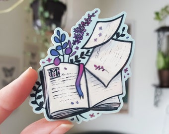 Sticker: Proud Book Lover | Subtle Pride Bi Flag Bookmark Floral Cottagecore LGBT Design 2 Options Blue or Clear Background 3-inch sticker