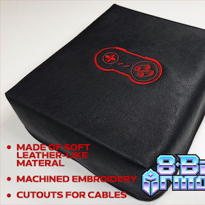 8Bit Armor Super Nintendo SNES-konsol dammskydd i konstläder med broderad logotyp och kabelutskärningar