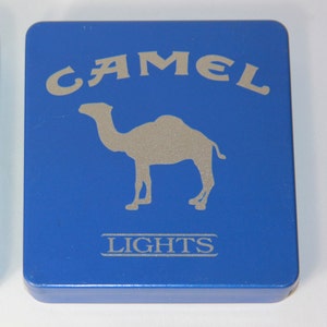 Vtg Tobacco Camel Lights Metal Cigarette Case Made In Germany - R.J Reynolds Tobacco Co. Winston-Salem, NC 27102 U.S.A 20 Class a Cigarettes