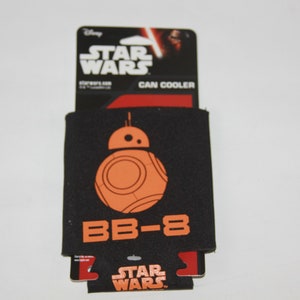 May include: Black and orange Star Wars can cooler featuring BB-8. The cooler has the words "Star Wars" and "Can Cooler" on the packaging.