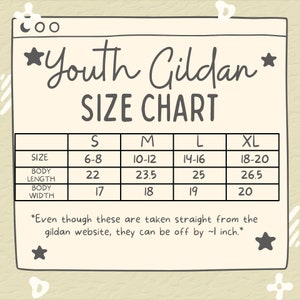 May include: Youth Gildan size chart for t-shirts, showing body length and width measurements in inches for sizes S, M, L, and XL. The chart notes that measurements may vary slightly.