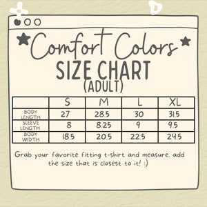May include: A size chart for adult t-shirts with measurements in inches for body length, sleeve length, and body width. The chart includes sizes S, M, L, and XL.