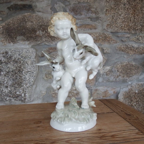 Vintage Porcelain Figurine by Karl Tutter for Hutschenreuther Selb Bavaria Porcelain Figure of Cherub or Putto with Rabbits Hares 1955-1968