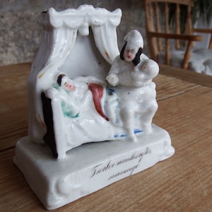 Antyczna niemiecka porcelanowa owiewka „Dwanaście miesięcy po ślubie”, XIX w.