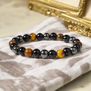 Pulseira elástica de proteção tripla para ele, pulseira de contas de olho de tigre, ônix preta e hematita, pulseira unissex com pedras preciosas protetoras
