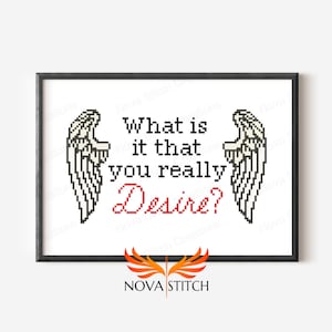 Pode incluir: Uma impressão emoldurada preta com asas de anjo brancas de cada lado do texto "What is it that you really Desire?" em preto e vermelho. O texto "NOVA STITCH" está em laranja na parte inferior da impressão.